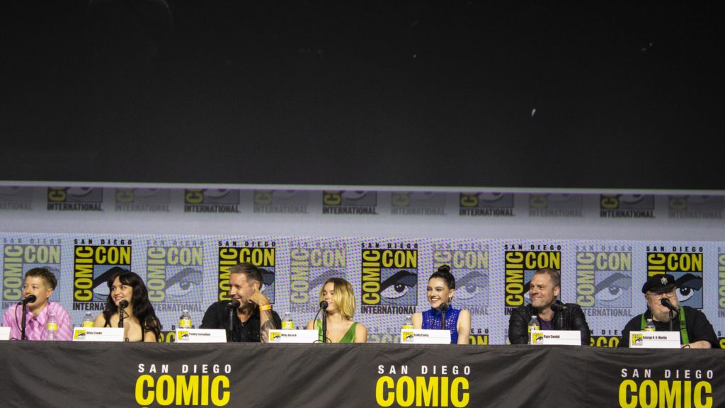 Emma D'Arcy, Olivia Cooke, Paddy Considine, Milly Alcock, Emily Carey, Ryan Condal, and George R.R. Martin at San Diego Comic-Con 2022 (House of the Dragon panel)